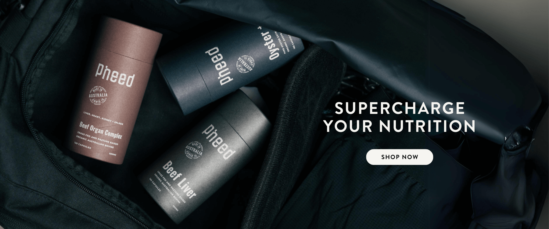 Pheed supplement bottles and powders arranged in gym bag