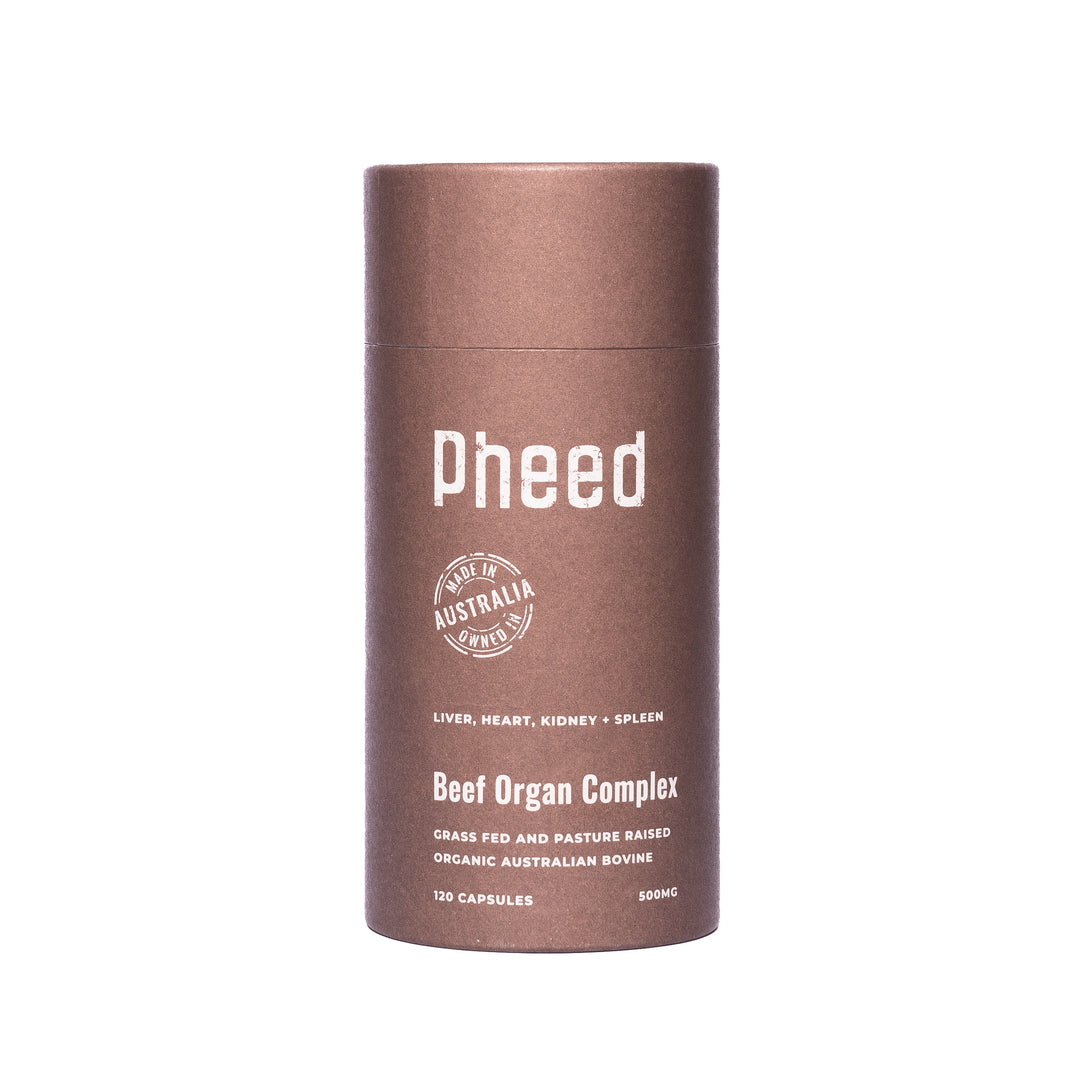 Red 'Beef Organ Complex' cylindrical container with 'Pheed' branding on a white background. Contains beef organ capsules.