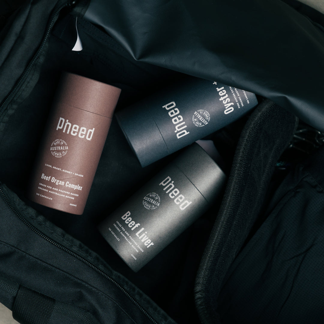 Pheed products Beef Liver, Beef Organ Complex and Oyster + in a black gym bag